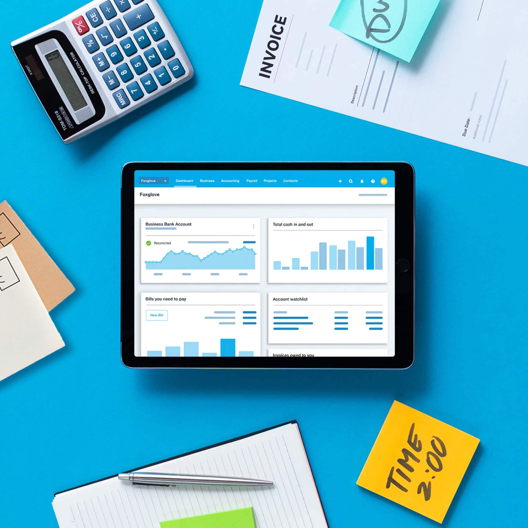 A tablet showing Xero's user interface with paper documents around it.