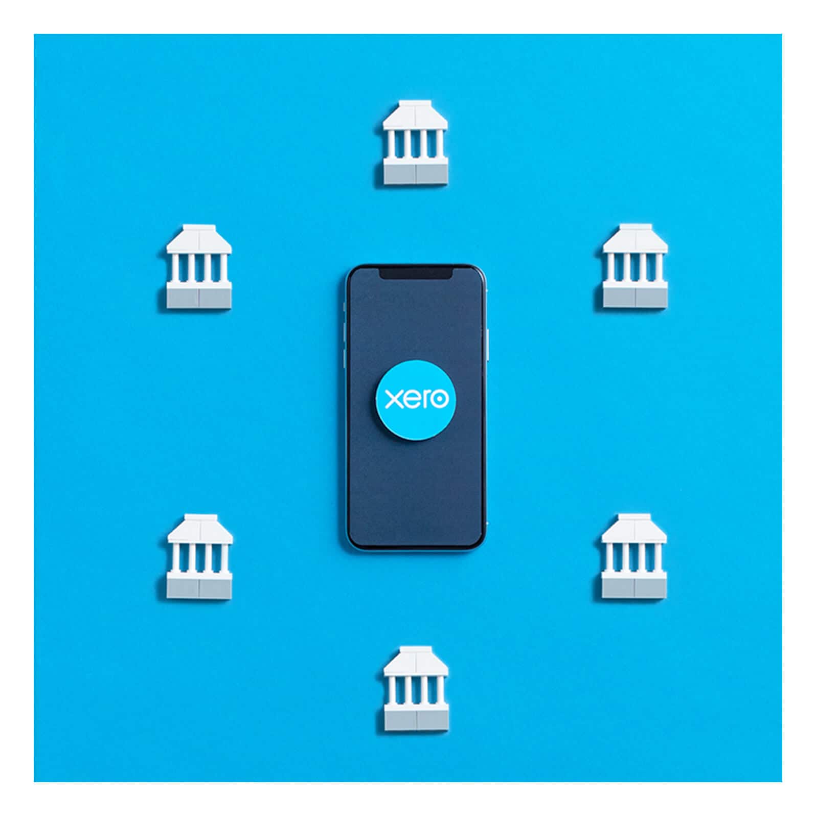 A mobile phone with six banking icons around it.