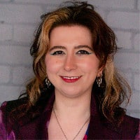 A headshot of Ebony-Storm Halladay