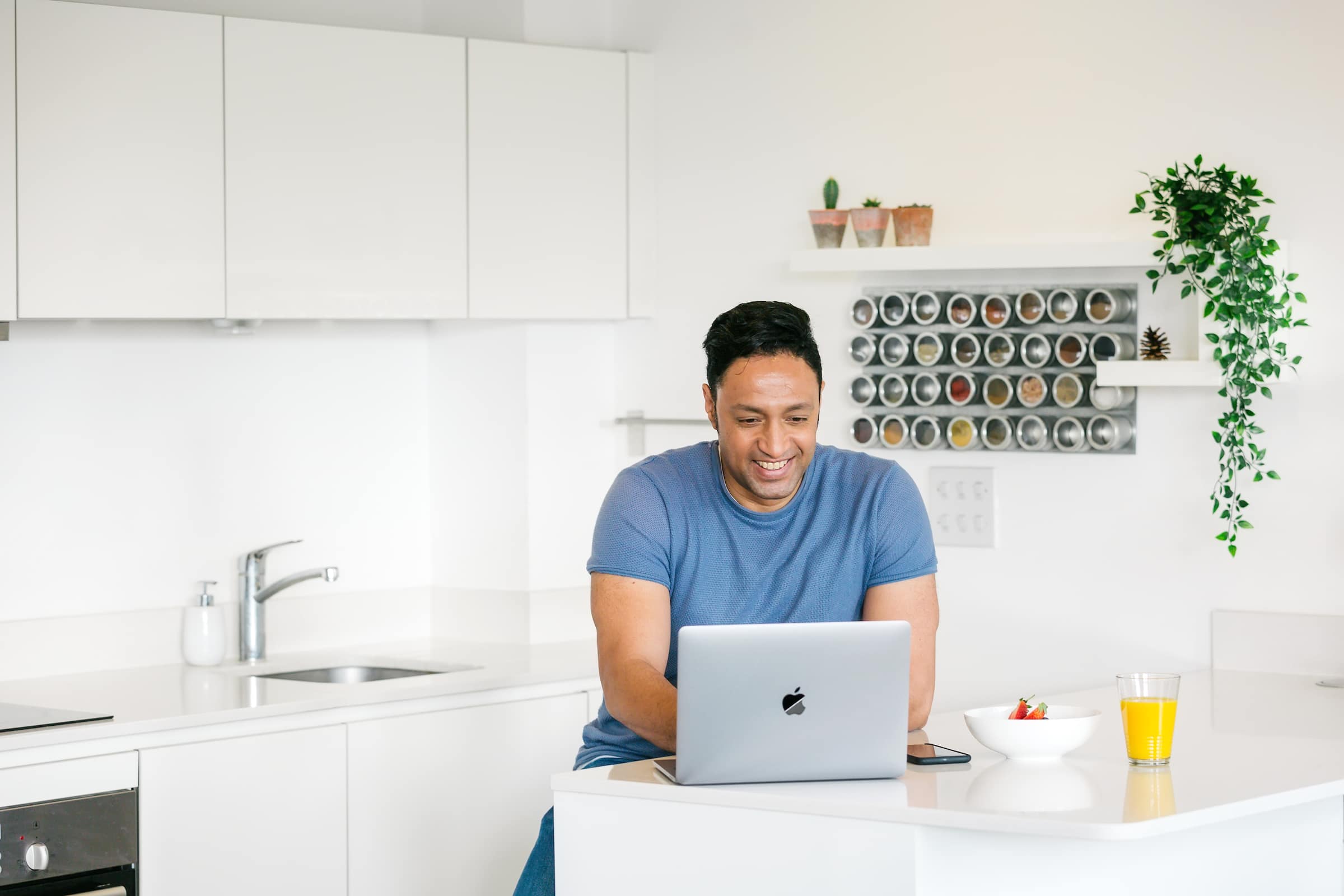 A person who works at an education business manages their accounts using Xero accounting software on their laptop.
