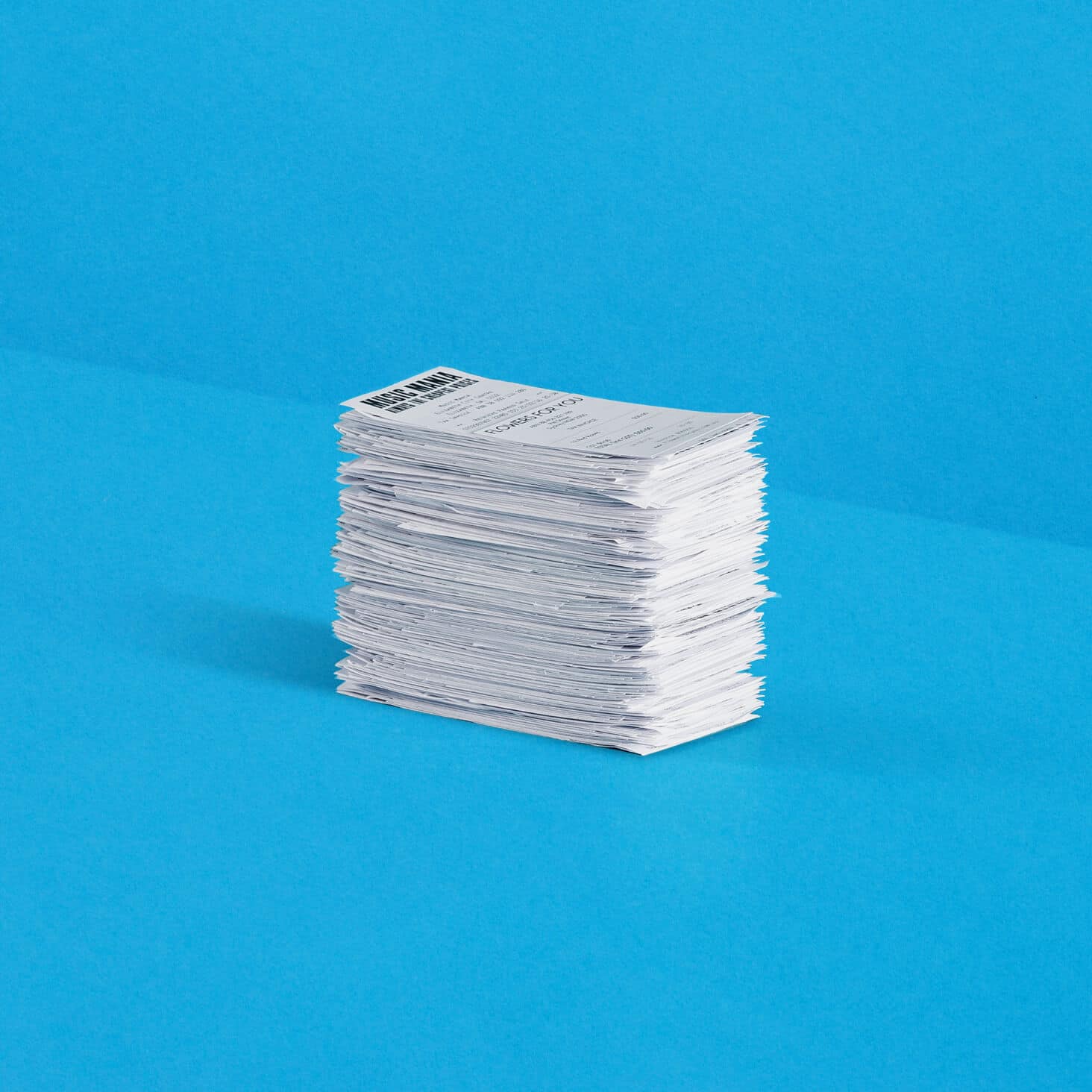 A large stack of receipts for expense reports.