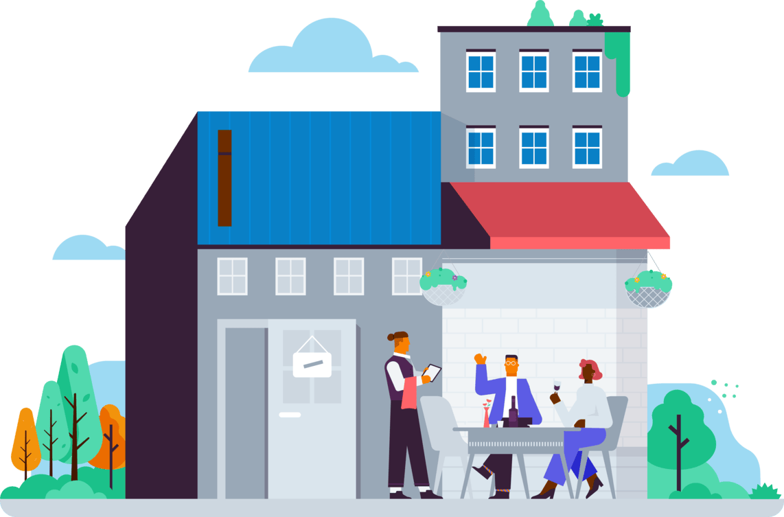 Two people sitting at a bar and restaurant while being served by a waiter.